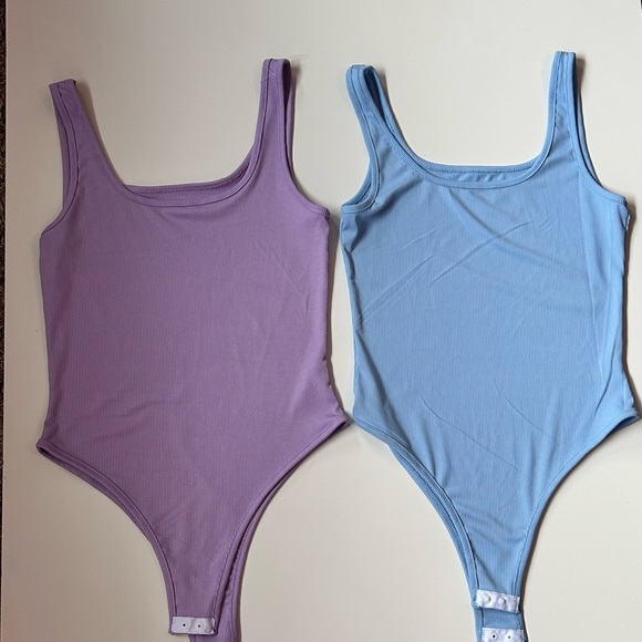 Purple and Blue Bodysuits with Scoop Neckline
Size small 2 for one (I) - Picture 2 of 6
